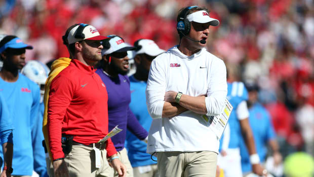 Nov 4, 2023; Oxford, Mississippi, USA; Mississippi Rebels head coach Lane Kiffin looks on during the first half against the Texas A&M Aggies at Vaught-Hemingway Stadium. Mandatory Credit: Petre Thomas-USA TODAY Sports
